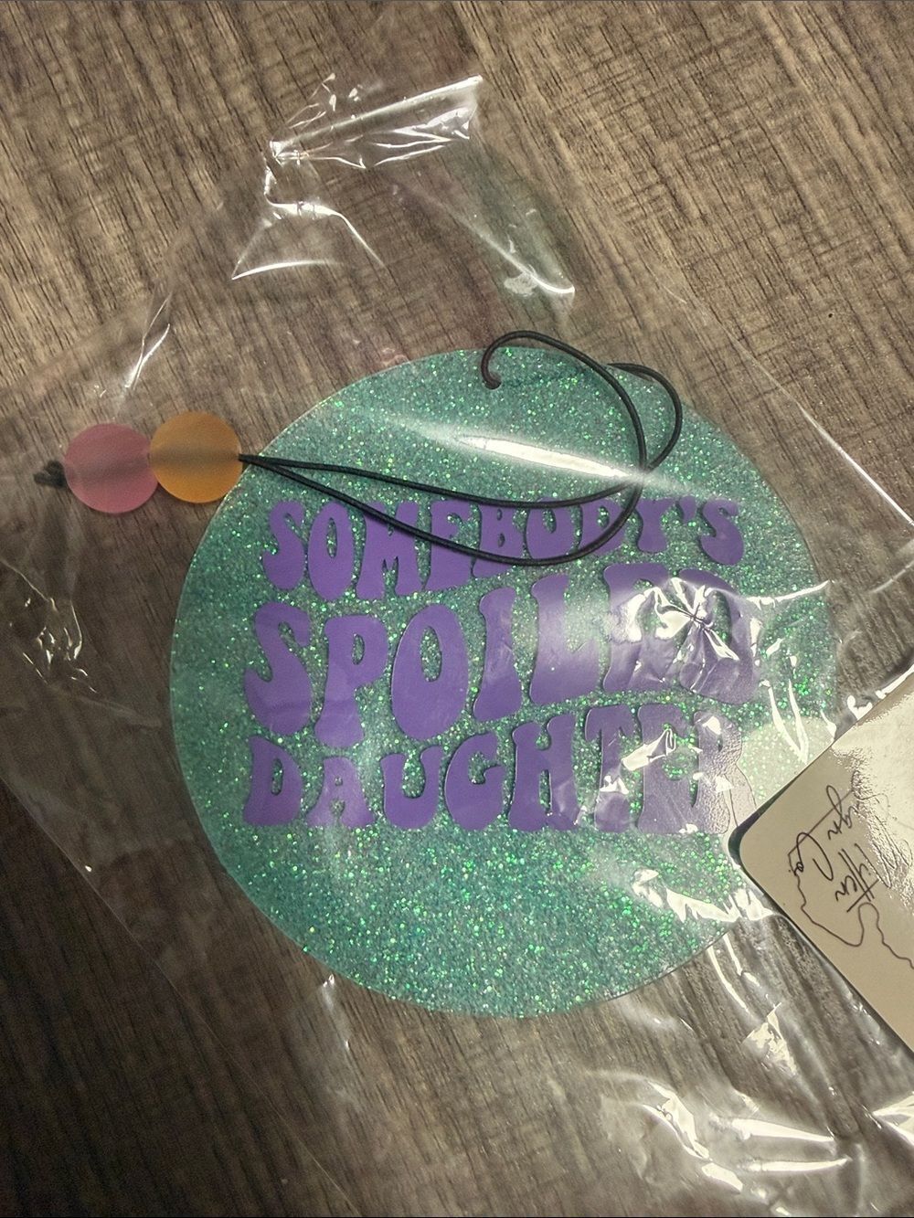 Glitter Teal 'Somebody's Spoiled Daughter' Hanging Sign - Purple Lettering